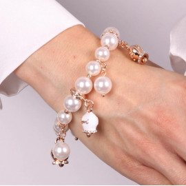 Bracciale in Metallo Bracciale in Metallo con perle e campanelle portafortuna in smalto bianco con scritta Capri